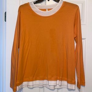 Light orange long sleeve top